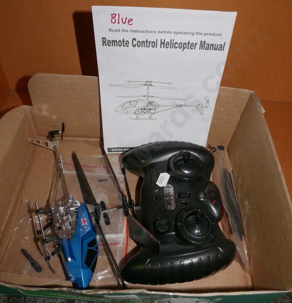 small blue remote helicopter  Image 1++