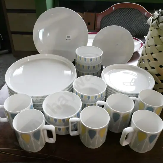 large assortment of Nood dinner items; plates, bowls, cups