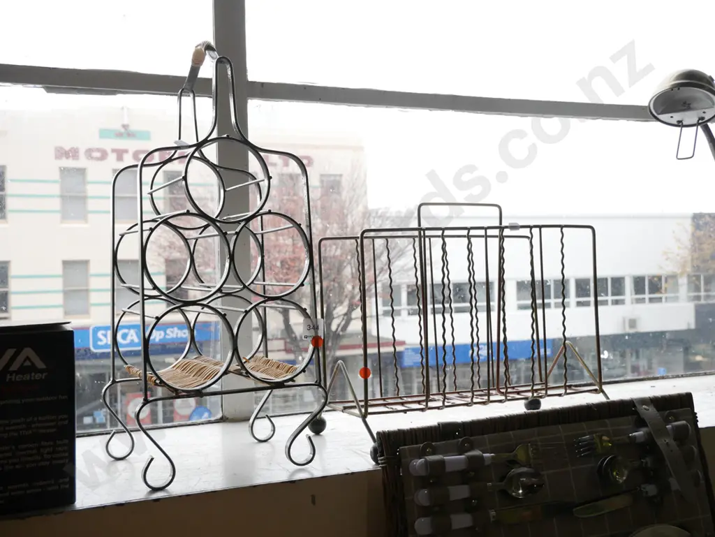 metal wine rack, mid-century magazine rack with black plastic ball feet - orange dots Image 1++