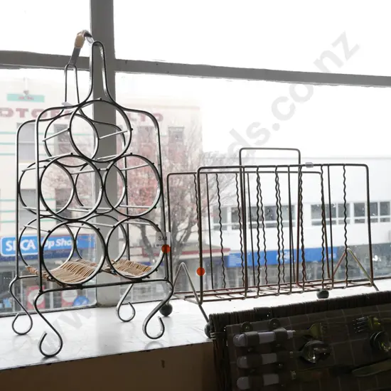 metal wine rack, mid-century magazine rack with black plastic ball feet - orange dots