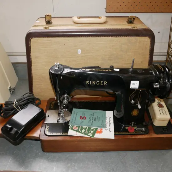 early Singer table top sewing machine
