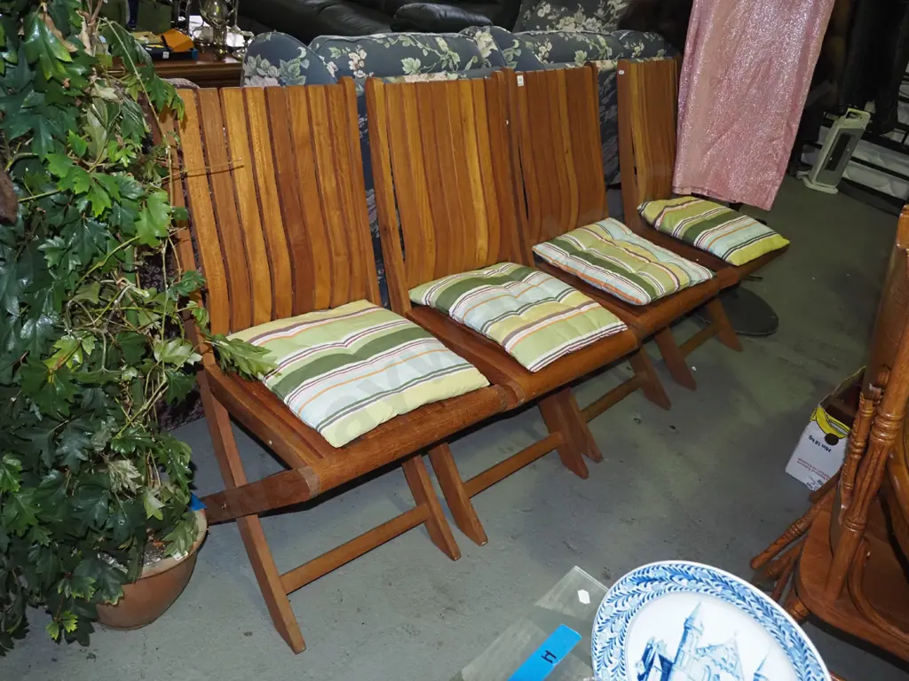 4x hardwood folding outdoor chairs with striped cushions - very good condition Image 1++