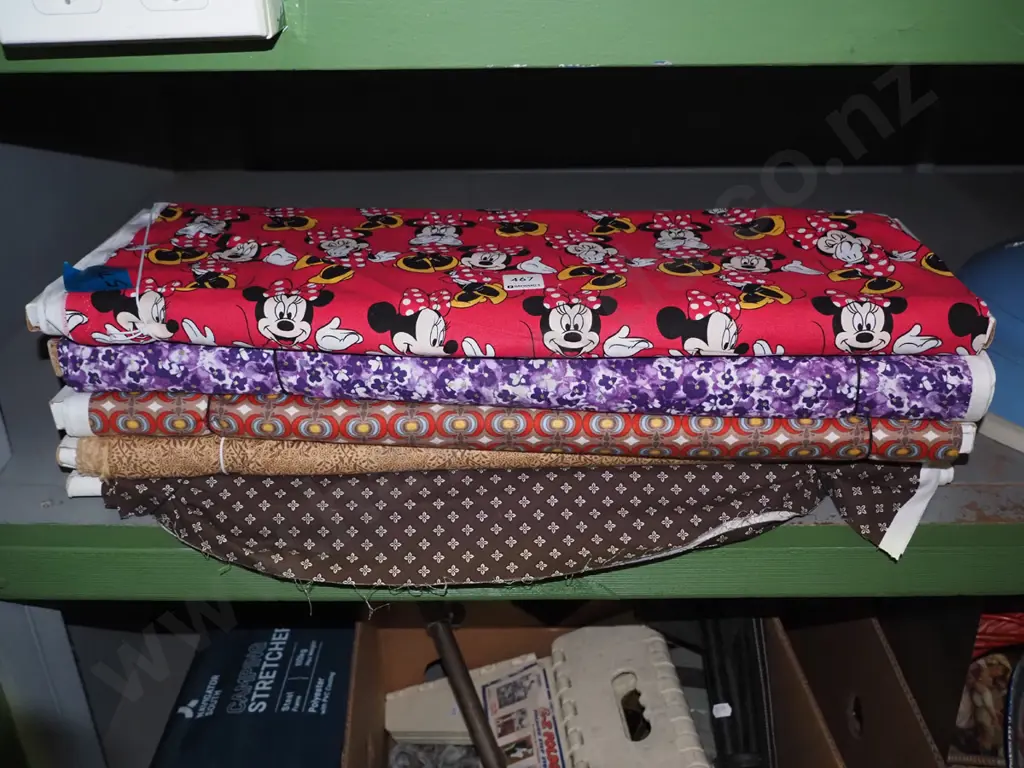 various bolts of fabric Image 1++