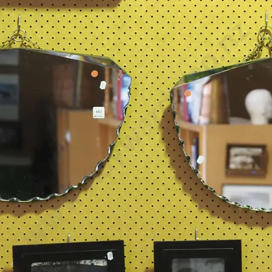 2x scalloped edge wall mirrors - red dots