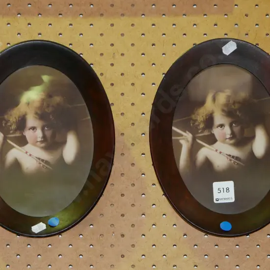 2x small wood framed oval cherub prints