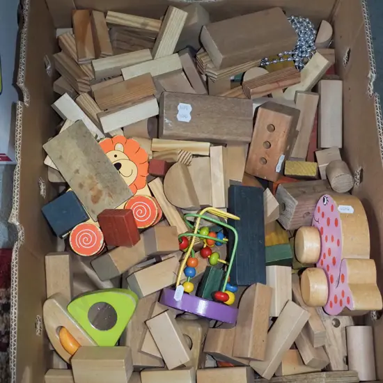 box of wooden blocks and toys