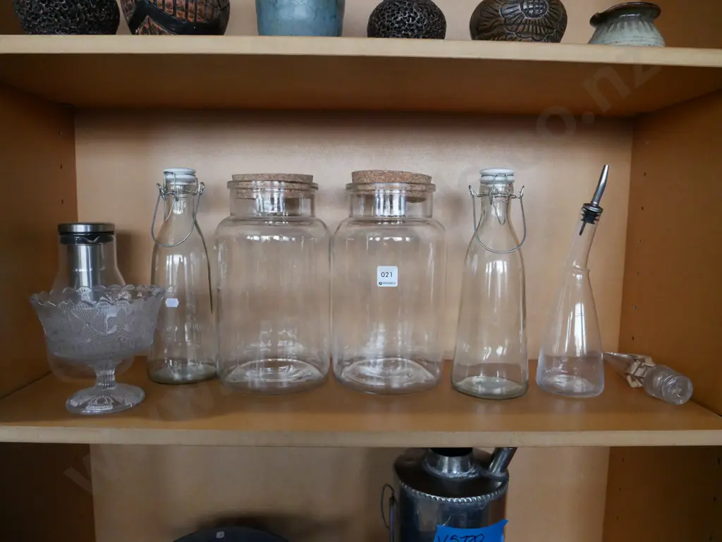 shelf of storage canisters, bottles and a Queen Victoria jubilee glass comport Image 1++