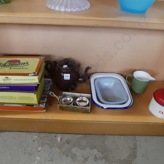 shelf of chocolate boxes, tea strainer, jug, enamel ware etc.