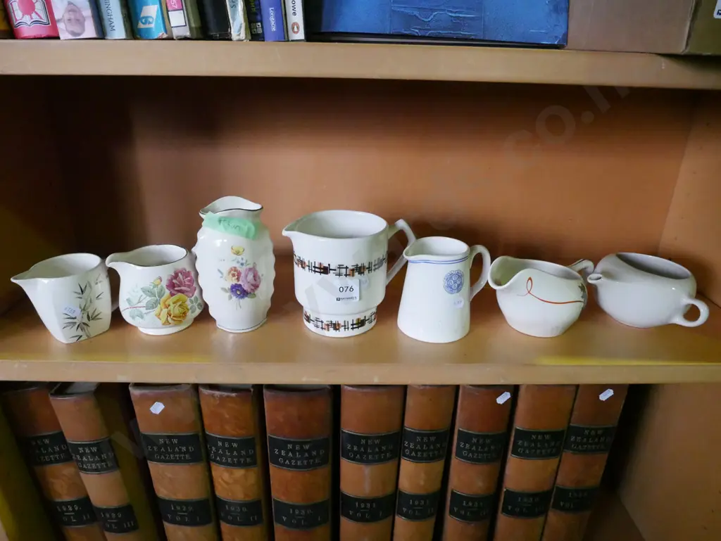 various small jugs and a Titian floral spray vase Image 1++