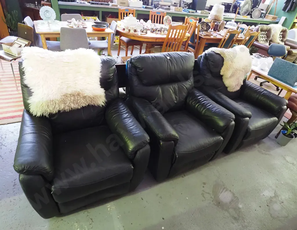 3 black vinyl upholstered reclining armchairs - some small rips and tears Image 1++
