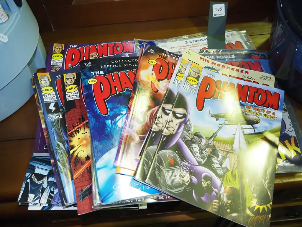 stack of Phantom comics Image 1++