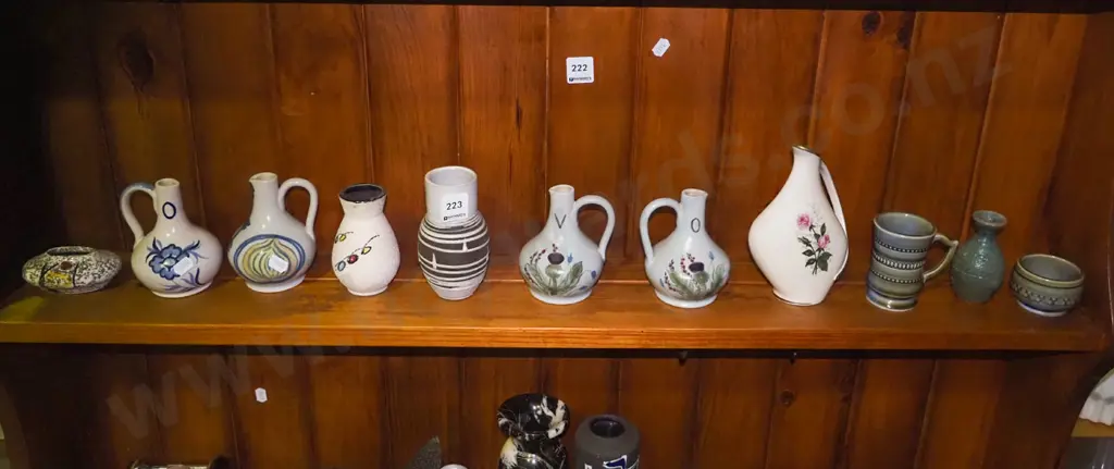 shelf of small vases Image 1++