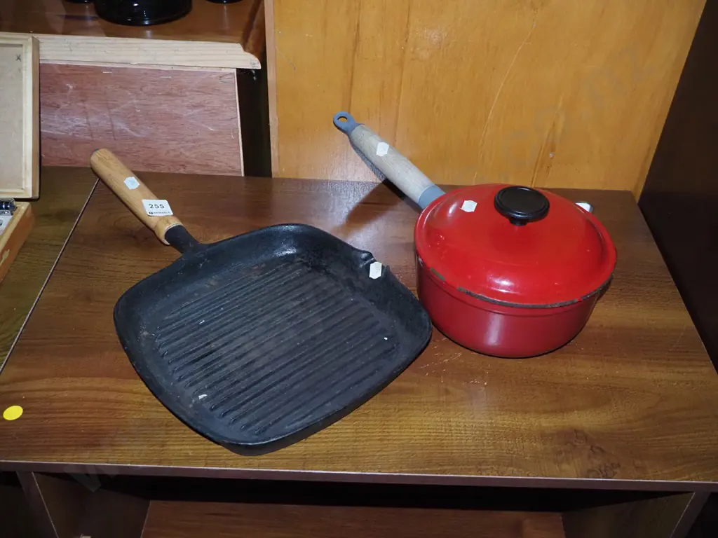 small cast-iron enamel sauce pan and a skillet Image 1++