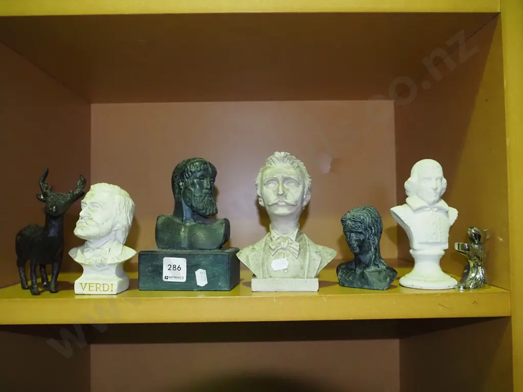 shelf of various busts and ornaments Image 1++