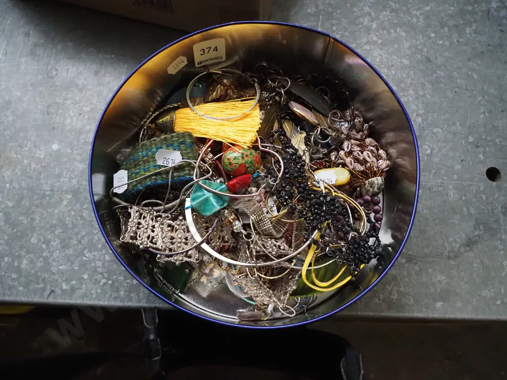 tin of costume jewellery Image 1++