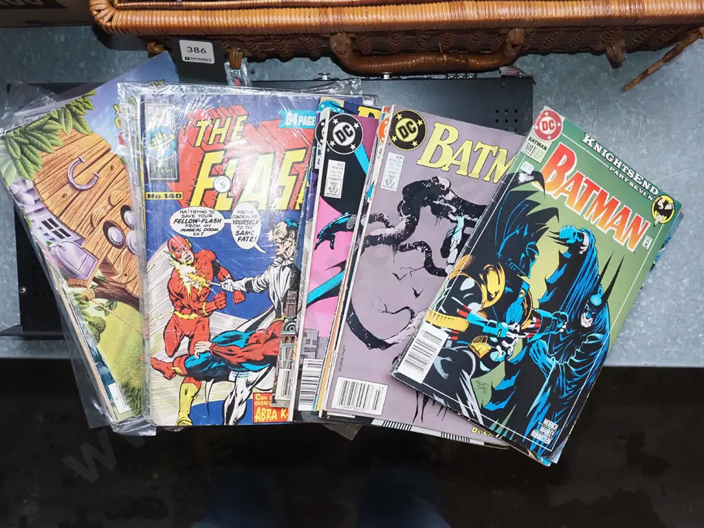 stack of various comic books Image 1++