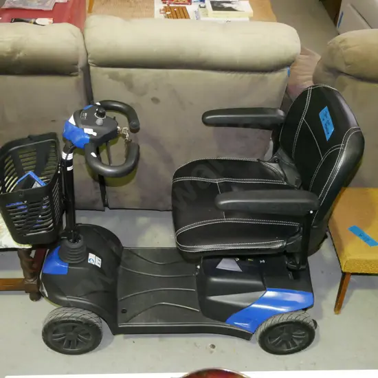 Invacare mobility scooter and charger - key in office