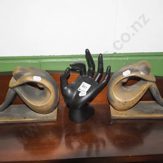 2x figural book ends, hand ring stand