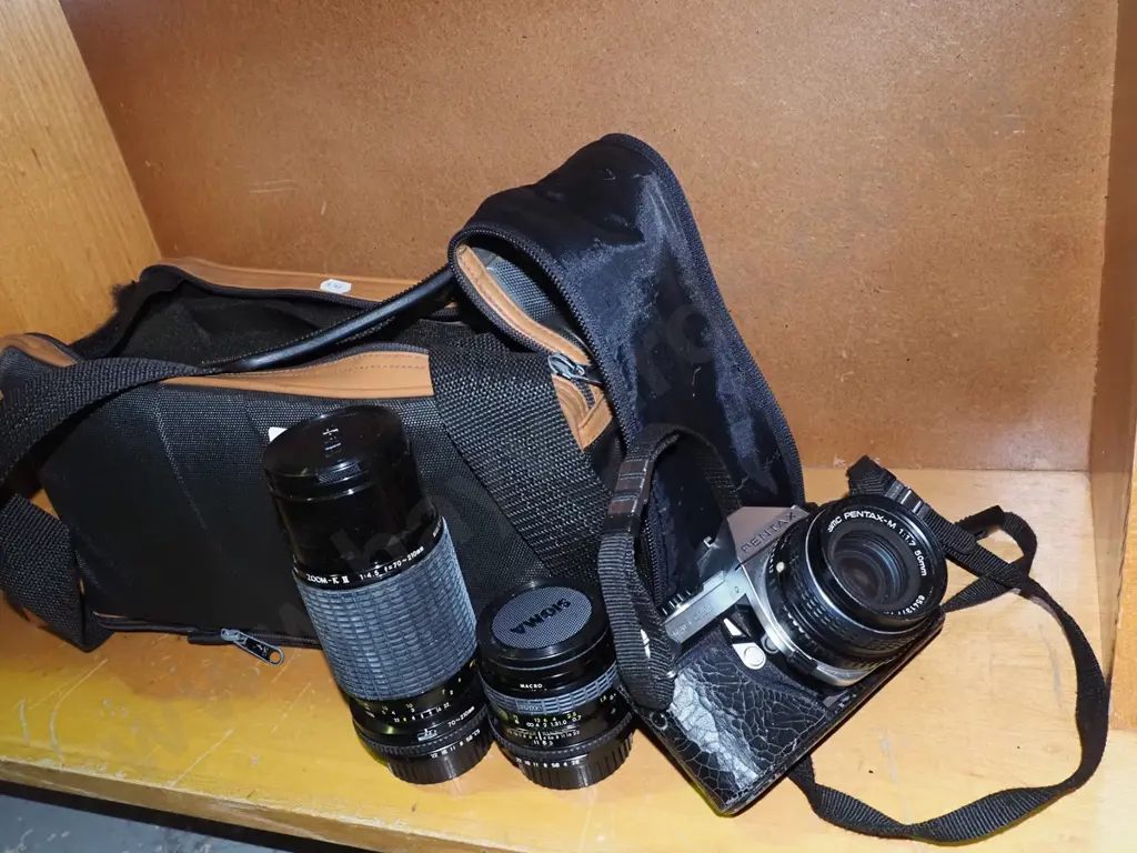 Pentax ME super 35mm camera with bag, additional lenses and other accessories Image 1++