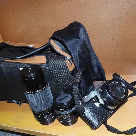 Pentax ME super 35mm camera with bag, additional lenses and other accessories