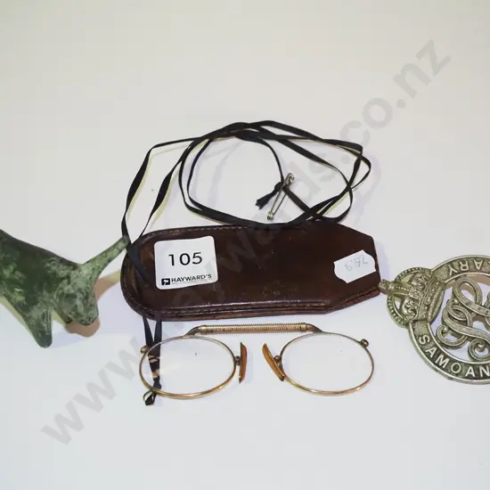 vintage glasses, Samoan constabulary badge, tiny cast iron bull figurine