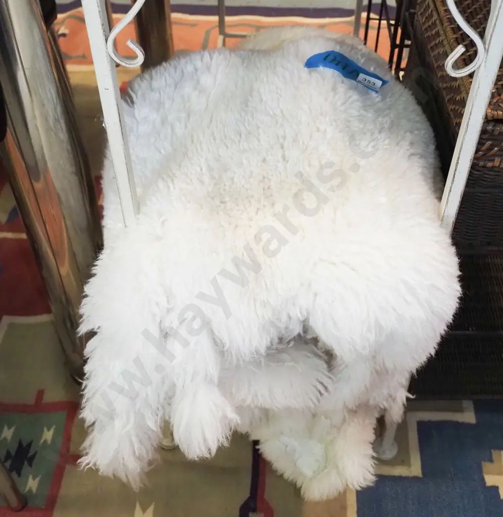 2 white sheepskins Image 1++