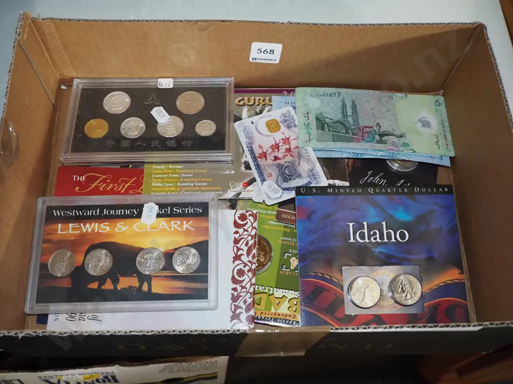 box of bank notes and collector coins Image 1++