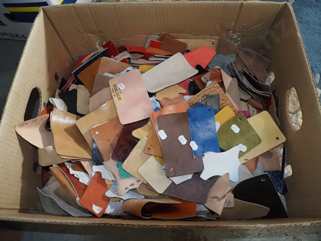 box of leather scraps Image 1++