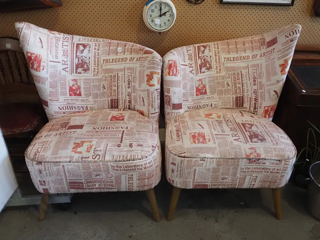 pair of post modern newspaper patterned upholstered chairs Image 1++