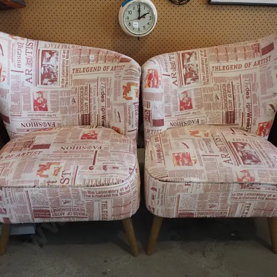 pair of post modern newspaper patterned upholstered chairs