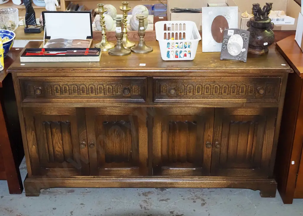 solid oak 4 door, 2 drawer sideboard with linen fold decorations to door H-700 W-1220 D-350 Image 1++