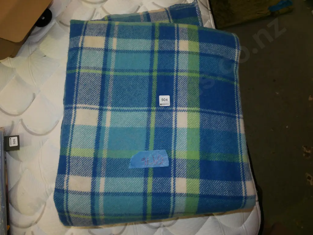 large checked blue rug - stains Image 1++