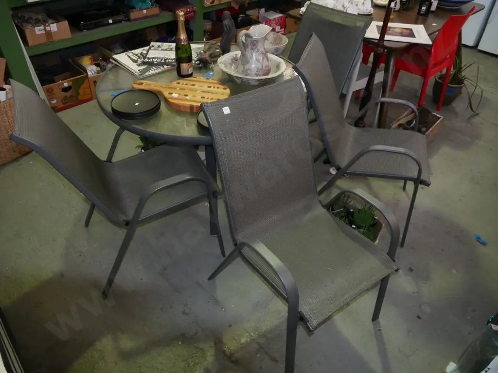 circular glass top and alloy patio table with 4 chairs - very good conditionn Image 1++