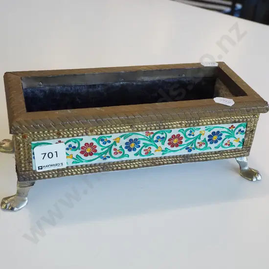 ornate footed trough and coins