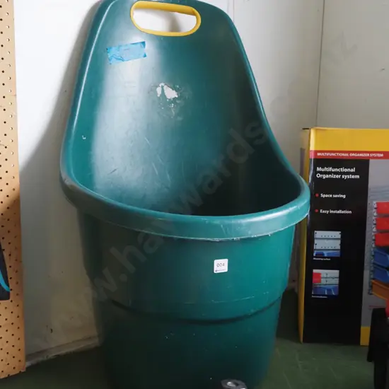 green plastic wheeled gardener's tub