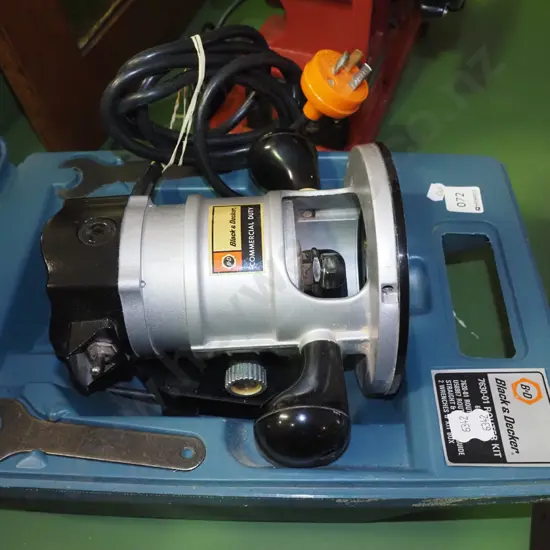 cased Black & Decker commercial duty router