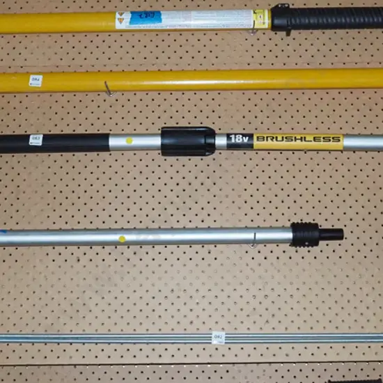 De Walt battery powered pole saw with additional extension pole - yellow dots