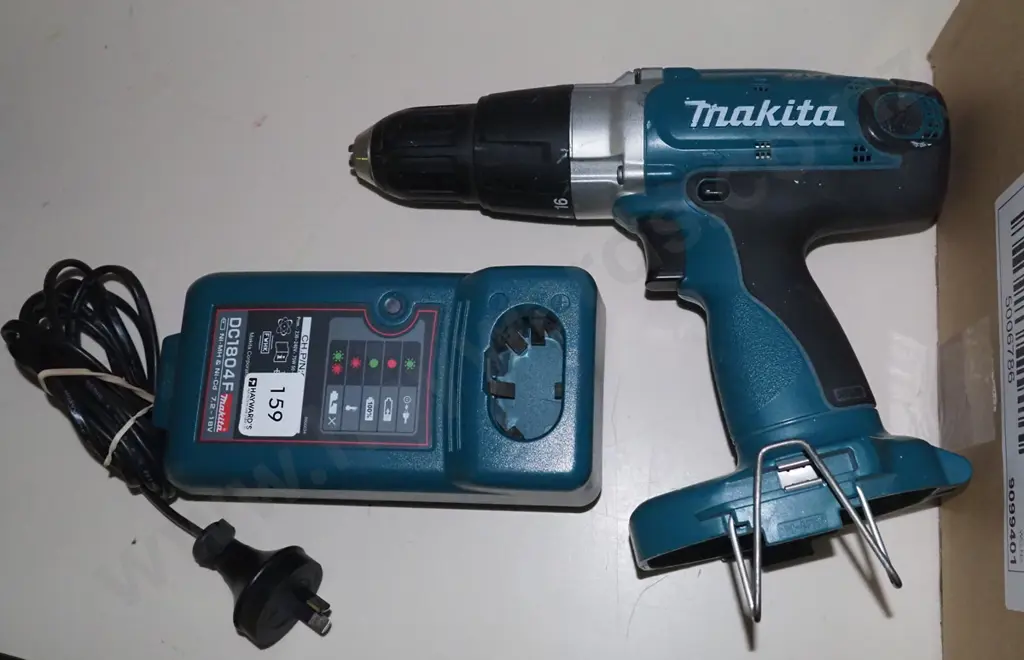 Makita 18V battery drill - no battery, has charger Image 1++