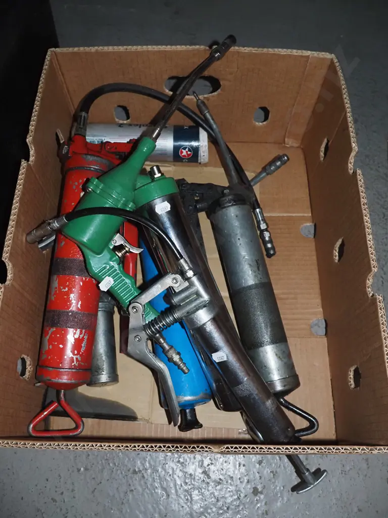 box; grease guns, adjusting tension screw etc Image 1++