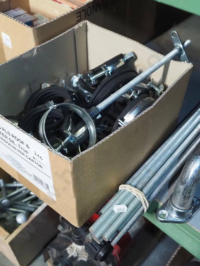 box of plumbers pipe clamps, bundle of threaded rods Image 1++