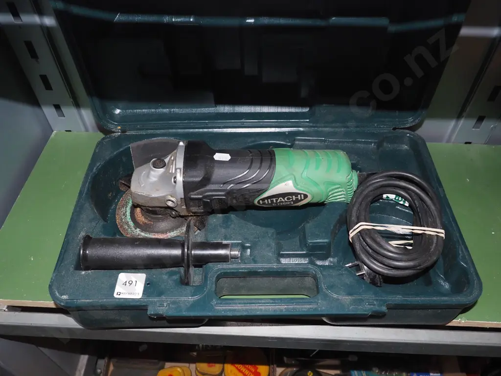 cased Hitachi angle grinder Image 1++