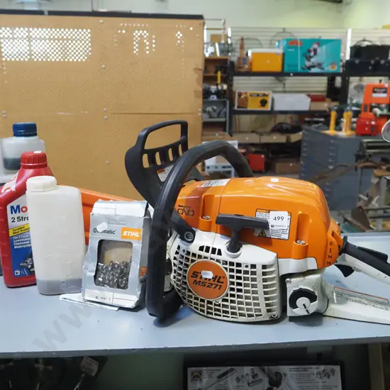 Stihl MS271 chainsaw with 2 stroke oil and additional chains