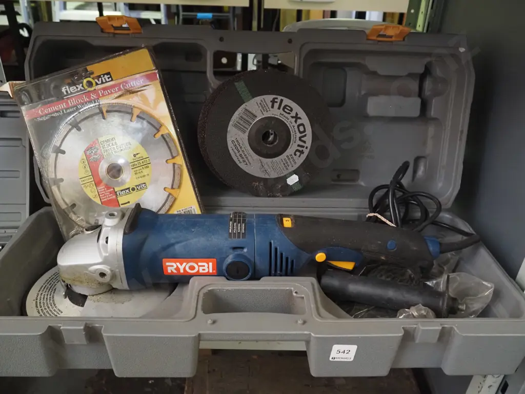 cased Ryobi angle grinder and accessories Image 1++
