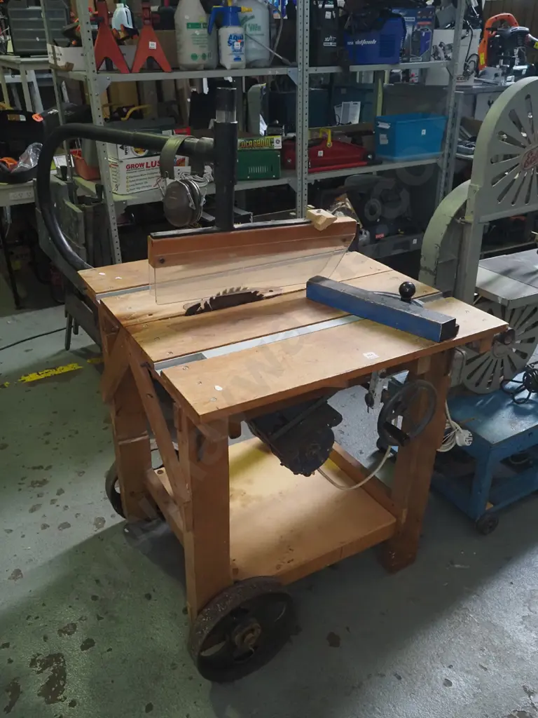 homemade wooden based table saw with Peltor ear muffs Image 1++