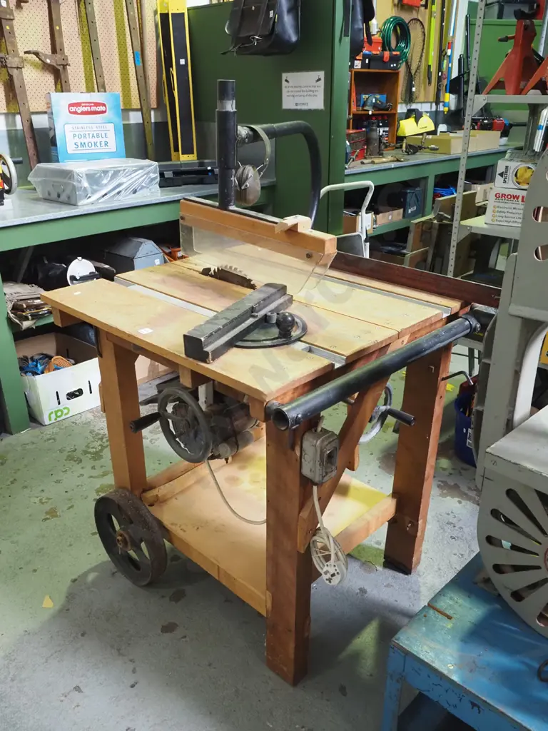 homemade wooden based table saw with Peltor ear muffs Image 1++