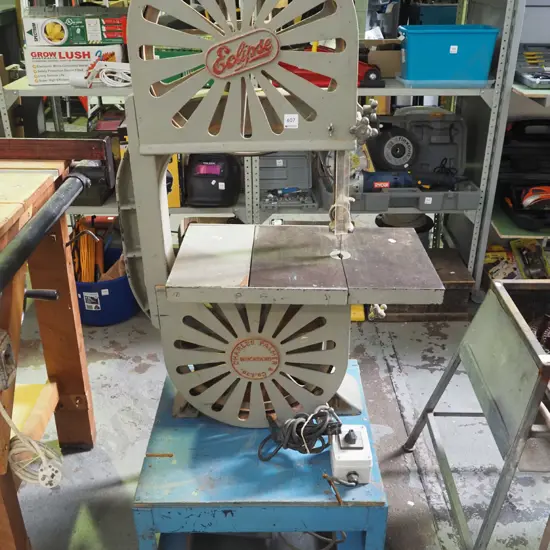 Eclipse vintage band saw on stand with casters