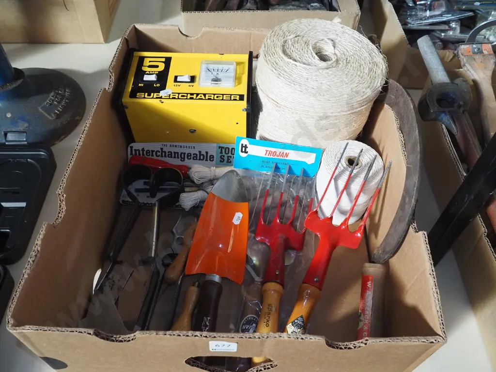 box; battery charger, garden hand tools, string etc Image 1++