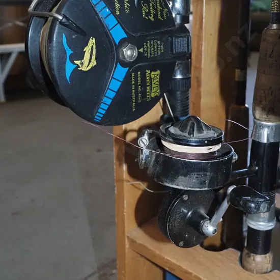 2x fishing rods and reels - red dots