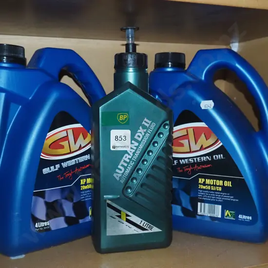 2x bottles of engine oil, 1x transmission oil