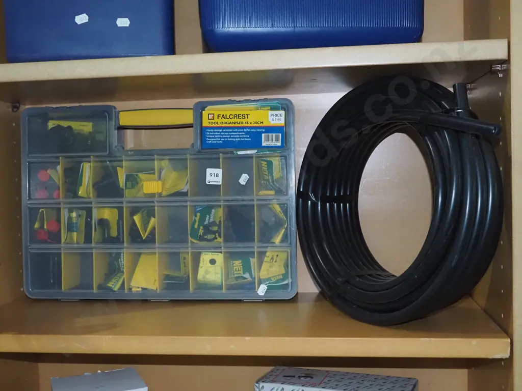 plastic organiser with Netta irrigation supplies, roll of plastic irrigation pipe Image 1++